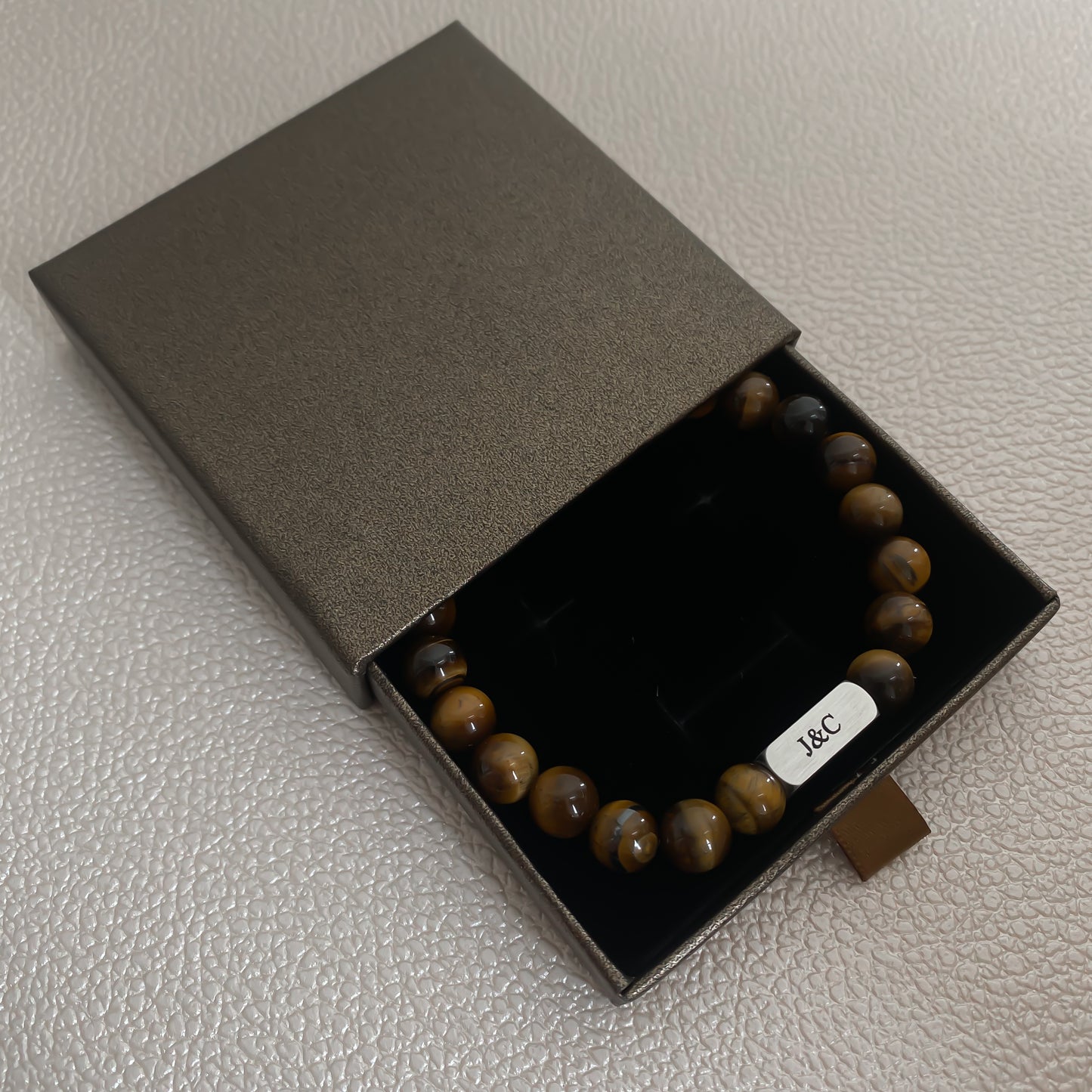 Man - gegraveerde natuurstenen armband