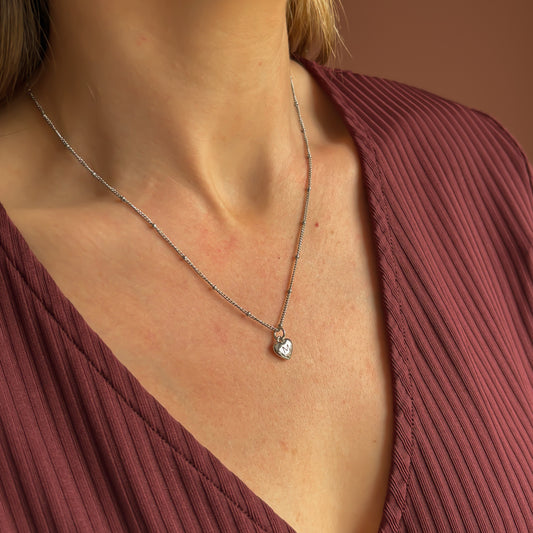 Minimalistisch hartje initiaal